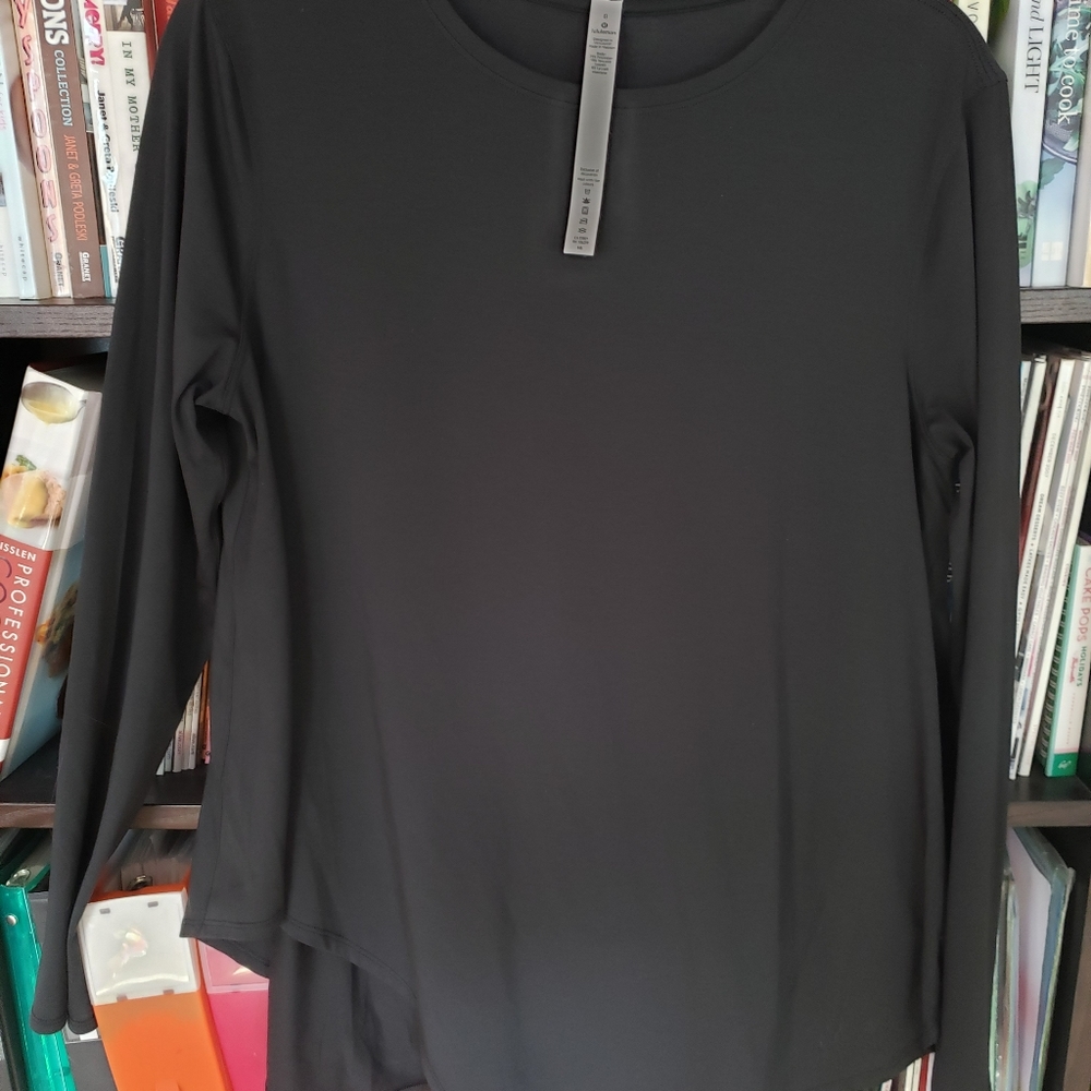 Lululemon long-sleeved top asymmetrical hemline. NWOT.